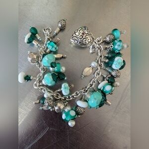 Charm Bracelet Heart Charm That Opens With A Cluster Of Beads.